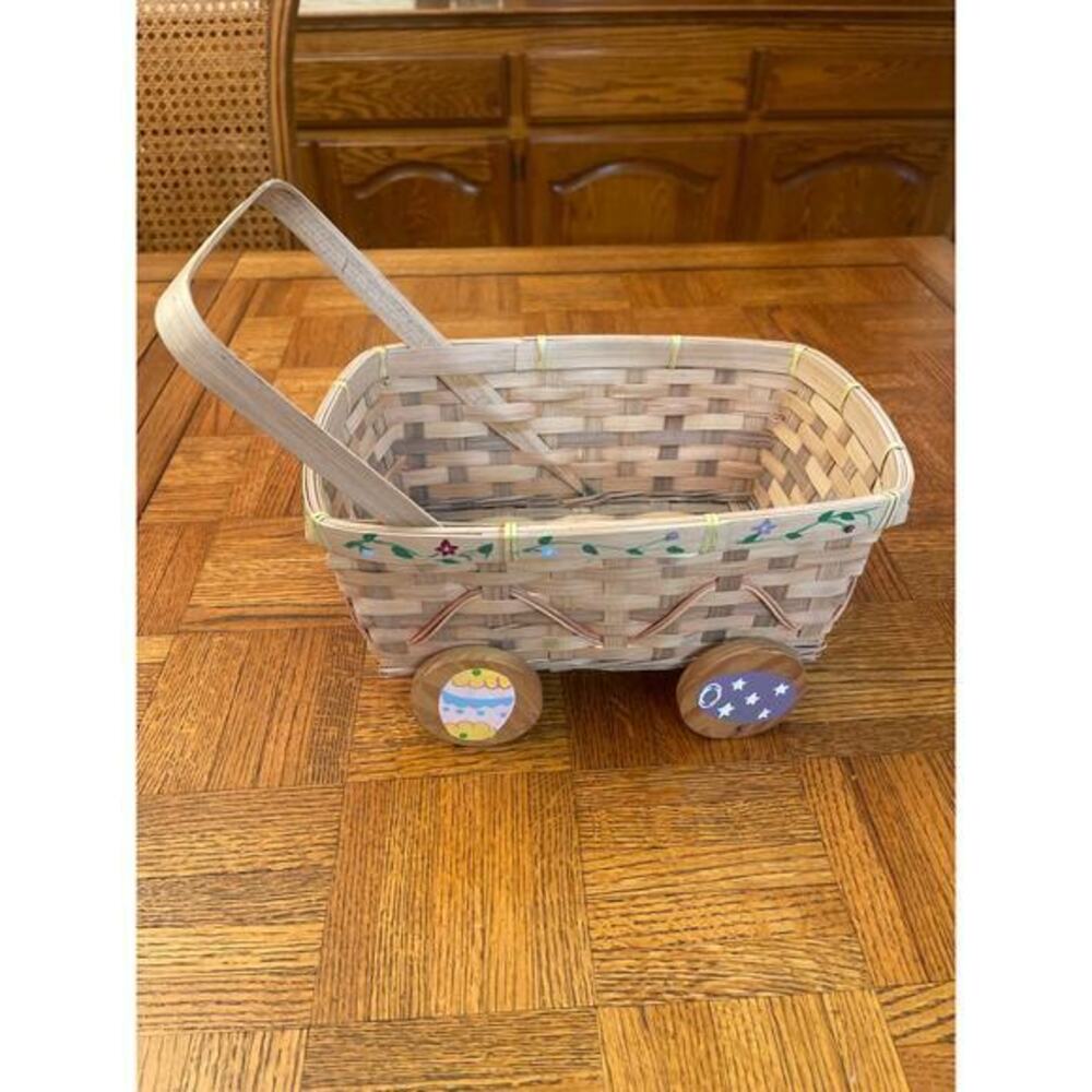 Woven wicker Easter pushcart basket with wooden wheels